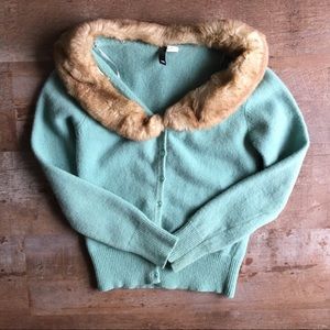 Divided baby mint blue cardigan with fur collar.